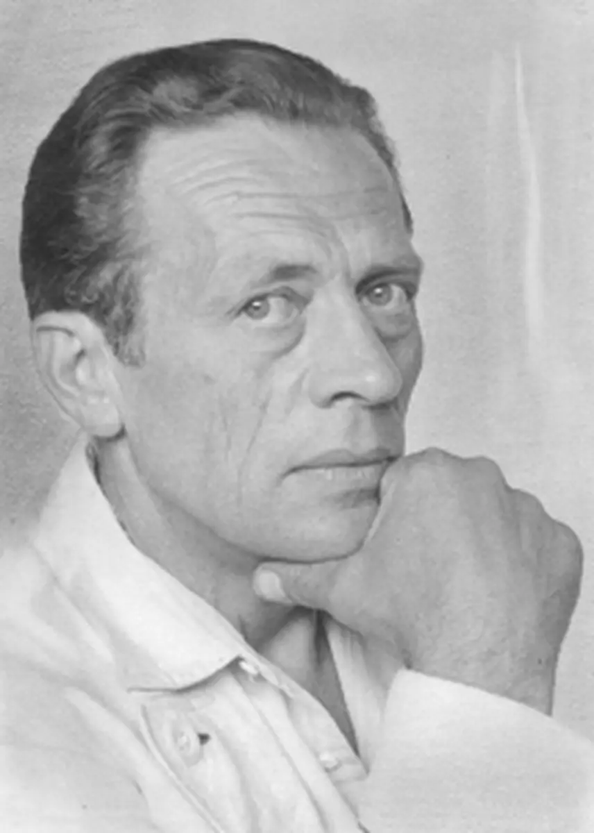 Harvey Fite resting his chin on his hand in a family archive portrait