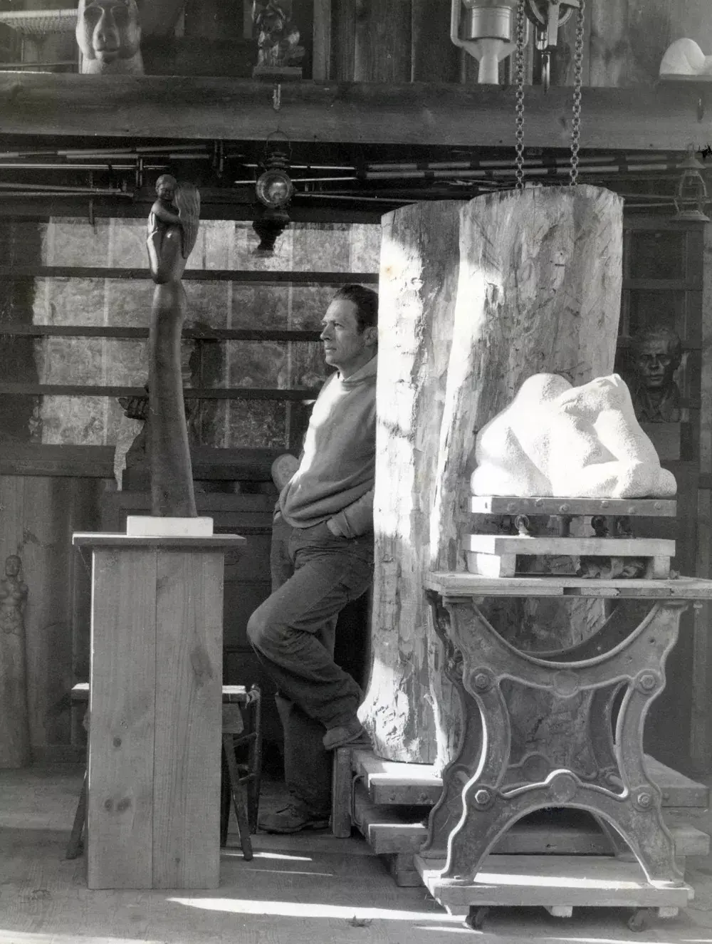 Harvey Fite standing among sculptures in his Saugerties studio
